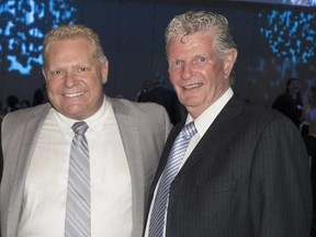 Doug Ford, left, at the 2016 Reena Foundation gala with Toronto Police Supt. Ron Taverner. (Kevin Viner, Elevator Digital)