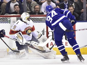 Toronto Maple Leafs centre Auston Matthews scores against Florida Panthers goaltender Roberto Luongo during first period on Wednesday night. ( THE CANADIAN PRESS/Frank Gunn)