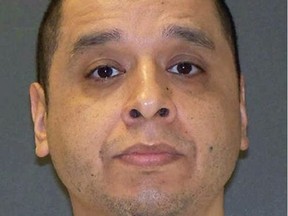 This photo provided by the Texas Department of Criminal Justice shows death-row inmate Joseph Garcia, who is set to die by lethal injection Tuesday, Dec. 4, 2018, for the December 2000 shooting death of 29-year-old Aubrey Hawkins _ a police officer with the Dallas suburb of Irving _ during a robbery.  (Texas Department of Criminal Justice via AP)