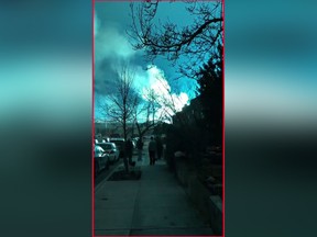 This video grab taken from footage obtained courtesy of Andrew Rios taken on Dec. 27, 2018, shows a blue light caused by a transformer explosion at a power plant in the Queens borough of New York City.