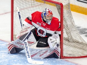 Mike DiPietro tracks the puck in the 67's zone during Saturday's game against the Olympiques at TD Place arena.