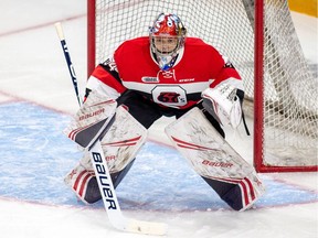 Goalie Mike DiPietro watches the play in front of him during his Ottawa 67's debut against the Gatineau Olympiques at TD Place arena on Saturday, Dec. 8, 2018.