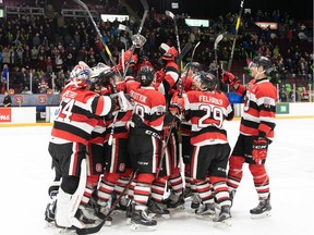 67's players celebrate Saturday's inter-league victory against the Olympiques.