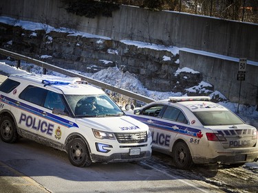 Ottawa police have the area around the Westboro transit station cordoned off with police tape and cruiser's Saturday Jan. 12, 2019, while the collision is investigated. Three people were killed and many were injured after an OC Transpo double-decker bus crashed on the transit way Friday afternoon.