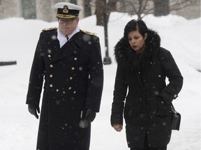 Vice-Admiral Mark Norman and his lawyer, Marie Heinen, return to the Ottawa courthouse following a break in the proceedings on Tuesday.