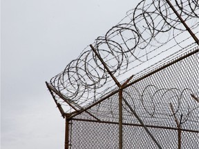 File photo of an exterior barbed wire fence at the Ottawa Carleton Detention Centre