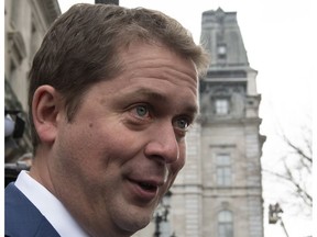 Conservative Leader Andrew Scheer responds to reporters questions after a meeting with Quebec Premier Francois Legault Thursday, November 1, 2018 in Quebec City.