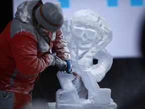 An ice sculptor competes in a competition during Winterlude.