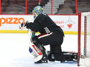 Anders Nilsson pauses during Tuesday's practice at Canadian Tire Centre.