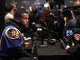 Los Angeles Rams defensive end Aaron Donald speaks to reporters during a media availability ahead of the NFL Super Bowl 53 football game against the New England Patriots Wednesday, Jan. 30, 2019, in Atlanta. (AP Photo/John Bazemore)
