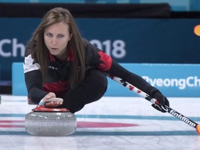 Canada's skip Rachel Homan delivers a shot as they face Switzerland during preliminary round in women's curling at the Pyeongchang 2018 Olympic Winter Games in Gangneung, South Korea, on Sunday, February 18, 2018.