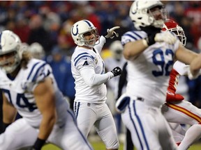 Indianapolis Colts' Adam Vinatieri (4) watches a missed field goal during the first half of the team's NFL divisional football playoff game against the Kansas City Chiefs in Kansas City, Mo., Saturday, Jan. 12, 2019.