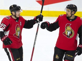 Ottawa Senators centre Matt Duchene celebrates his second goal of the game with teammate Cody Ceci during the third period against the Colorado Avalanche at the Canadian Tire Centre on Wednesday, Jan. 16, 2019.