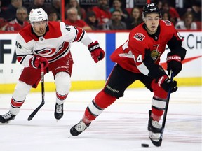 Jean-Gabriel Pageau, right, played his first game of the season for the Sens against the Hurricanes on Sunday after recovering from an Achilles tendon injury.