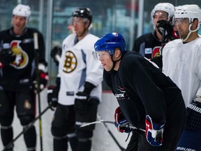 Chris Kushneriuk is seen here in a 2013 file photo as he skates with other area pros in a pre-season scrimmage at the Bell Sensplex.
