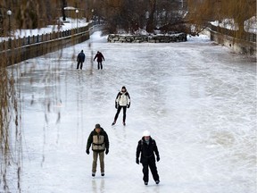 People skate at Paterson Creek on the Rideau Canal Skateway on its opening day, in Ottawa on Sunday, Dec. 30, 2018.