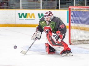 Ottawa 67's goalie Cedrick Andree tracks the puck during a 5-3 win over the Saginaw Spirit on Sunday.