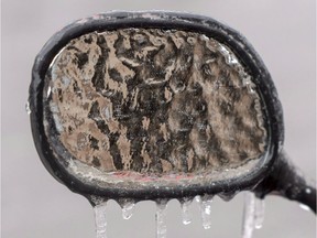 An ice-covered mirror.