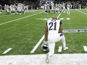 Los Angeles Rams defender Aqib Talib watches as players warm up before the NFC championship game against the New Orleans Saints Sunday, Jan. 20, 2019, in New Orleans. (AP Photo/David J. Phillip)