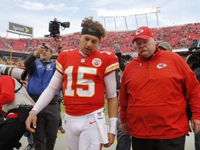Quarterback Patrick Mahomes (15) and head coach Andy Reid are two reasons why the Chyiefs could end the trend and knock off the Patriots tonight. (AP Photo/Charlie Riedel