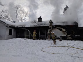 Ottawa firefighters were battling a blaze Sunday at a two-storey detached home at 1757 Woodroffe Ave.