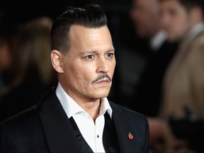 Johnny Depp attends the 'Murder On The Orient Express' World Premiere at Royal Albert Hall on November 2, 2017 in London, England.