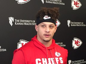 Chiefs Patrick Mahomes became only the second quarterback in NFL history to throw for 
50 touchdowns and 5,000 passing yards in a season.  Don Brennan/Postmedia Network