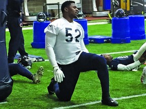Khalil Mack of the Chicago Bears stretches during Friday's workout. Don Brennan/Postmedia