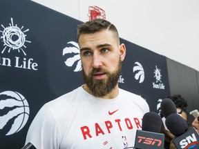 Injured Raptors’ Jonas Valanciunas still is a month away from returning to action with the team.  Ernest Doroszuk/Toronto Sun