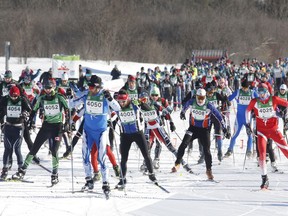 Skiers leave the start of the 27km free technique cross-country ski race at the Gatineau Loppet on Sunday, February 17, 2019.