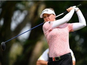 Brooke M. Henderson of Canada plays the shot during the first round of the Honda LPGA Thailand at the Siam Country Club Pattaya on February 21, 2019 in Chonburi, Thailand.