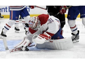 Canadiens goaltender Carey Price makes a save against the Tampa Bay Lightning on Saturday, Feb. 16, 2019, in Tampa, Fla.