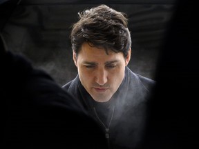 Prime Minister Justin Trudeau arrives to a caucus meeting on Parliament Hill in Ottawa on Wednesday, Feb. 20, 2019.