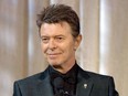 In this June 5, 2007 file photo, singer David Bowie accepts the lifetime achievement award at the 11th Annual Webby Awards in New York.