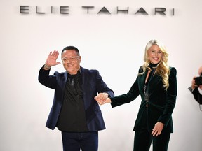 Designer Elie Tahari and Christie Brinkley walk the runway for the Elie Tahari fashion show during New York Fashion Week: The Shows at Gallery II at Spring Studios on Feb. 7, 2019 in New York City. (Dia Dipasupil/Getty Images for NYFW: The Shows)