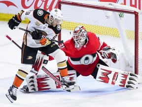 Former Ducks winger Brian Gibbons tries to score on Sens goalie Anders Nilsson in a game earlier in February. Gibbons made his Sens debut on his birthday on Tuesday. THE CANADIAN PRESS