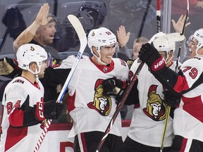 Alex Formenton, second from left, celebrates with teammates after scoring for the Senators against the Maple Leafs in the 2018 rookie tournament at Laval, Que.