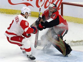 Senators goaltender Craig Anderson (41) makes a save on a breakaway by Red Wings' Justin Abdelkader during the third period of a game in Ottawa on Feb. 2.