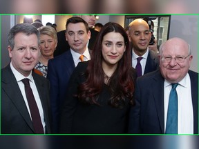 (From Left) U.K. MPs Chris Leslie, Angela Smith, Gavin Shuker, Luciana Berger, Chuka Umunna and Mike Gapes, pose for a photograph following a press conference in London on Feb. 18, 2019, where they announced their resignation from the Labour Party, and the formation of a new independent group of MPs.