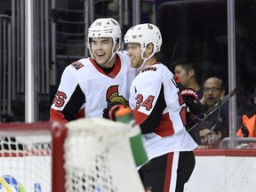 Ottawa Senators left wing Oscar Lindberg (24), of Sweden, celebrates his goal with left wing Magnus Paajarvi (56) during the first period of an NHL hockey game against the Washington Capitals, Tuesday, in Washington.