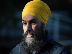 NDP Leader Jagmeet Singh is interviewed while door knocking for his byelection campaign, in Burnaby, B.C., on Saturday Jan. 12, 2019.