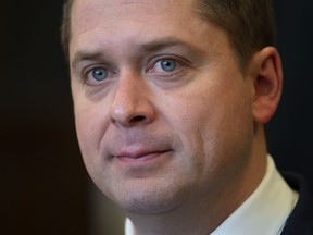 Leader of the Opposition Andrew Scheer speaks with the media in the Foyer of the House of Commons in West Block, Monday, Feb. 25, 2019, in Ottawa.