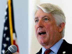 In this Oct. 24, 2018 file photo, Virginia Attorney General Mark Herring announces a new Clergy Abuse Hotline his office is launching as he addressed a press conference at his office in Richmond, Va.