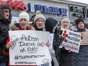 Parents protest outside MPP Lisa MacLeod's constituency office in Barrhaven on Friday, Feb. 8, 2019.