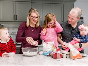The Garniss family in their kitchen at home in St. Mary’s, Ont. From left: Levi (2), Kim (mom), Lillian (5), Mike (dad), Lauren (six months when photo was taken.)