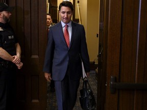 Prime Minister Justin Trudeau arrives in the Foyer of the House of Commons to attend question period before the tabling of the budget on Parliament Hill in Ottawa on March 19, 2019. (THE CANADIAN PRESS)