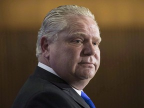 Ontario Conservative leader Doug Ford takes questions from journalists during a pre-budget lock-up as the Ontario Provincial Government prepares to deliver its 2018 Budget at Queens Park Legislature in Toronto on Wednesday, March 28, 2018.