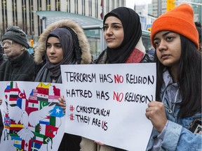 Maryam Albahrani, Rukaya Merhi and Noor Fatima attended a vigil at the Human Rights Memorial near Ottawa City Hall in memory of those affected by the mass shooting in Christchurch, N.Z.