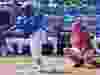 Toronto Blue Jays’ Vladimir Guerrero Jr., left, follows through with a double as Philadelphia Phillies catcher Andrew Knapp looks on in the third inning of a spring training baseball game, Thursday, Feb. 28, 2019, in Dunedin, Fla.