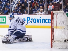 Leafs goalie allows the winning goal in OT in Wednesday’s game against Vancouver. THE CANADIAN PRESS
